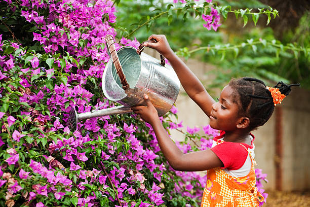 Teach Your Child Responsibility and Boost Confidence with this Simple Daily Task: Watering Plants