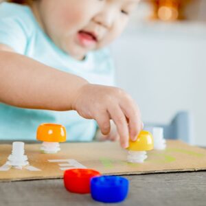 Unlock Your Child’s Motor Skills with a Fun Montessori Activity: Bottles with Screwing Lids