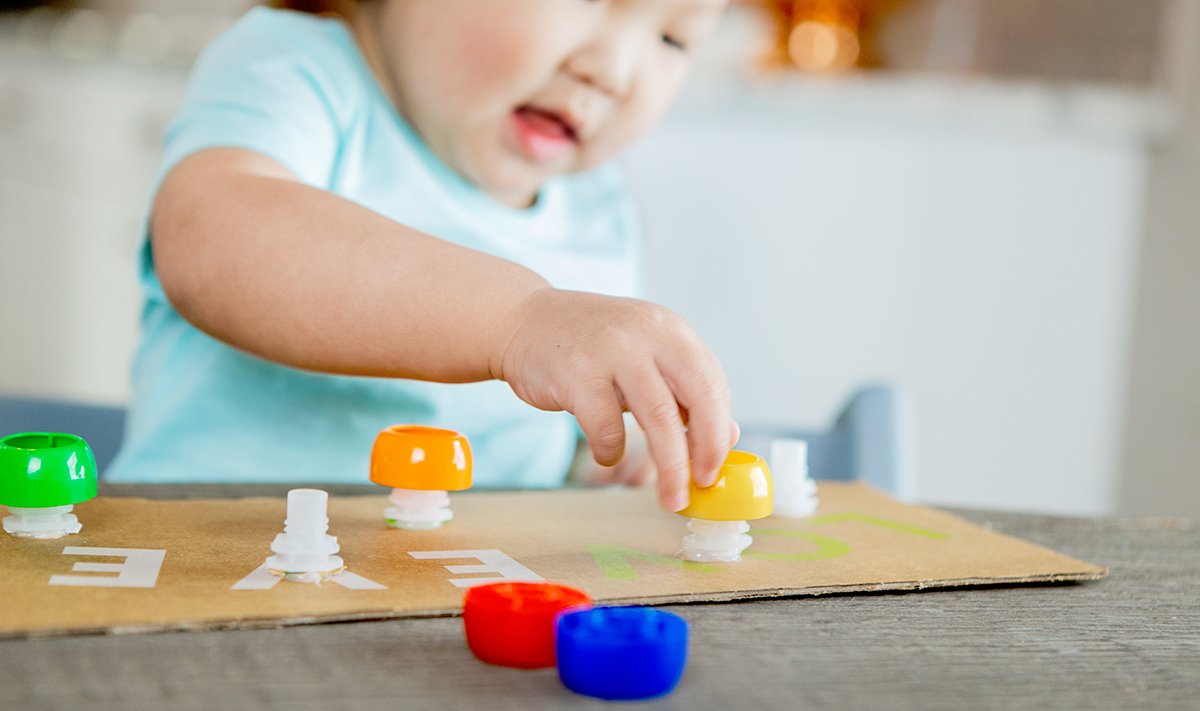 Unlock Your Child’s Motor Skills with a Fun Montessori Activity: Bottles with Screwing Lids