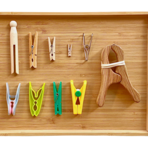 Unlock Your Child's Motor Skills with a Fun Montessori Activity: Pegs and Basket