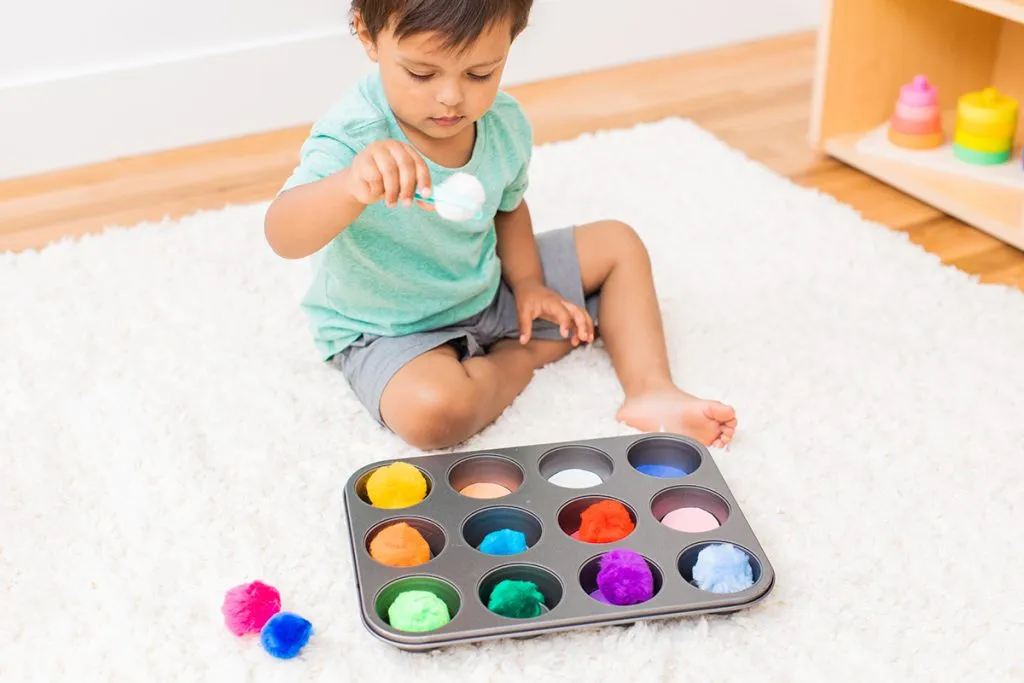 Unlock Your Child's Motor Skills with a Fun Montessori Activity: Pom Poms