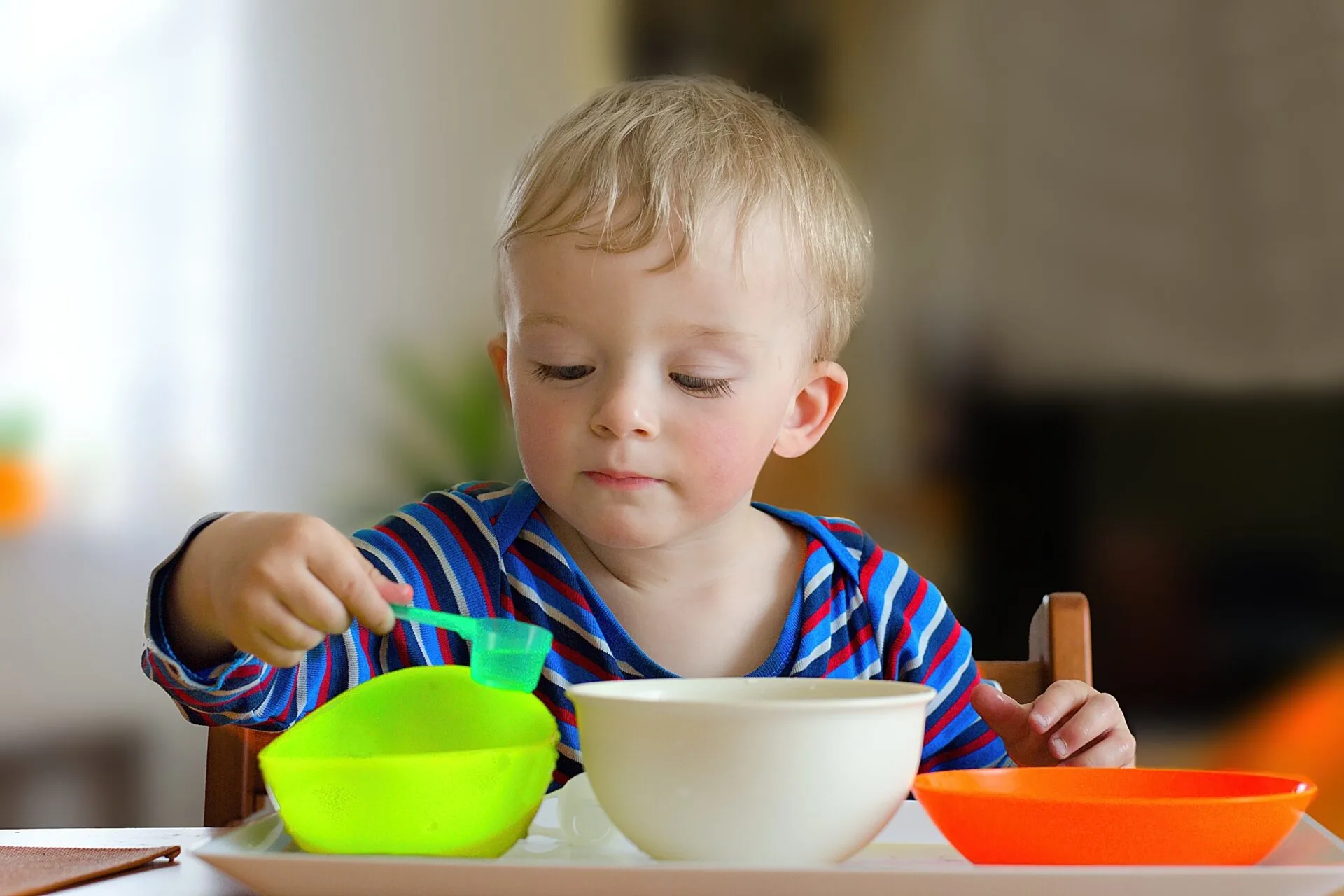 Unlock Your Child's Motor Skills with a Fun Montessori Activity: Spooning