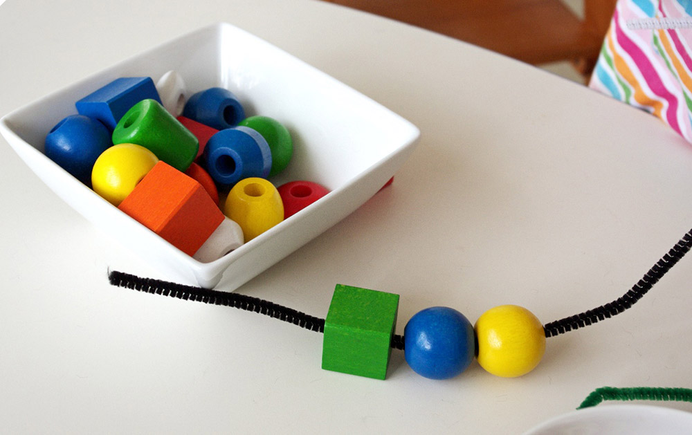 Unlock Your Child’s Motor Skills with a Fun Montessori Activity: Threading and Making Necklaces