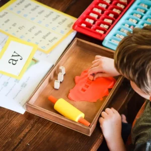 Unlock Your Child's Motor Skills with a Fun Montessori Activity: Unglue a Stamp