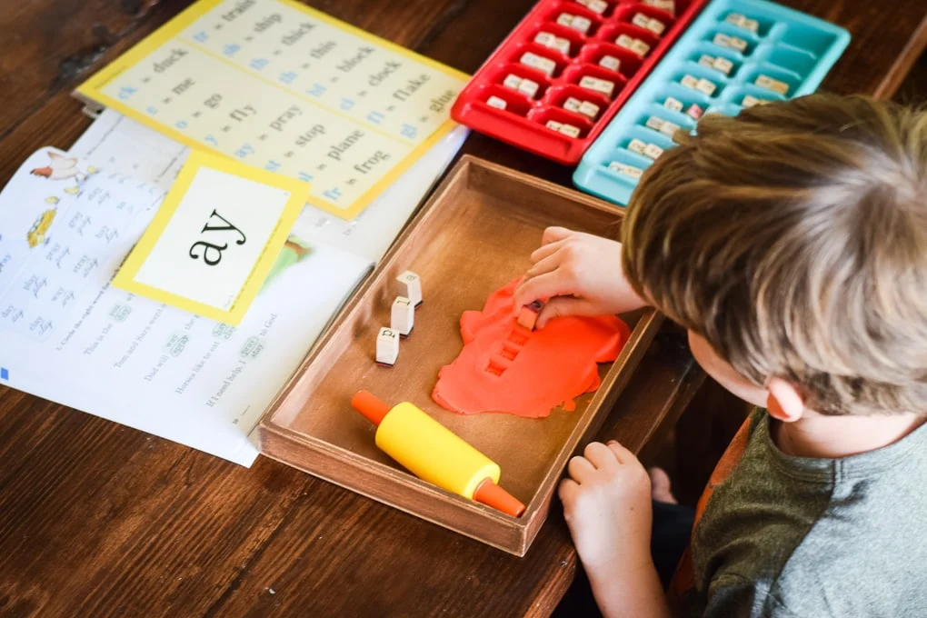 Unlock Your Child's Motor Skills with a Fun Montessori Activity: Unglue a Stamp