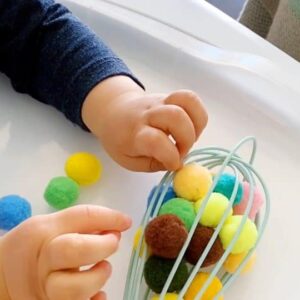 Unlock Your Child's Motor Skills with a Fun Montessori Activity- Using a Whisk